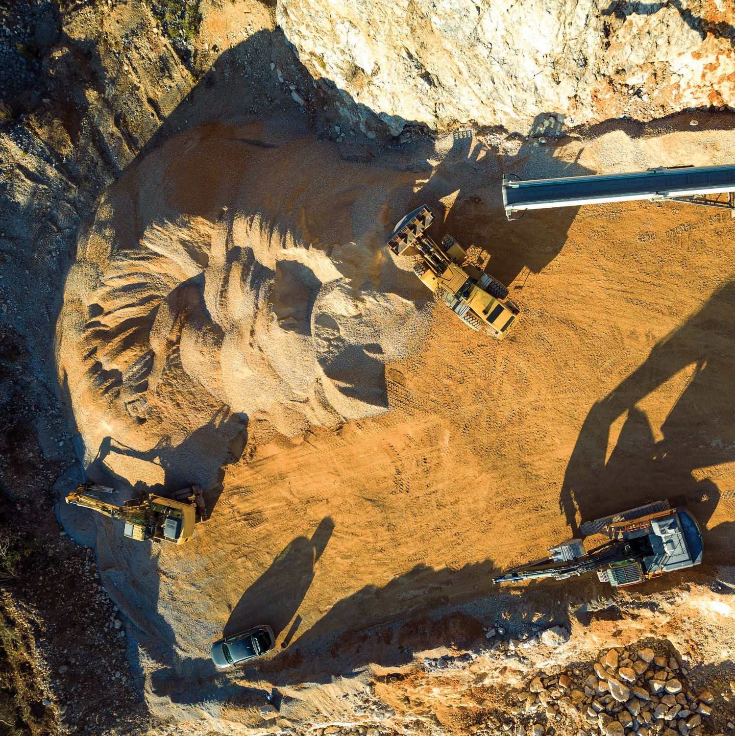 Excavators working the face